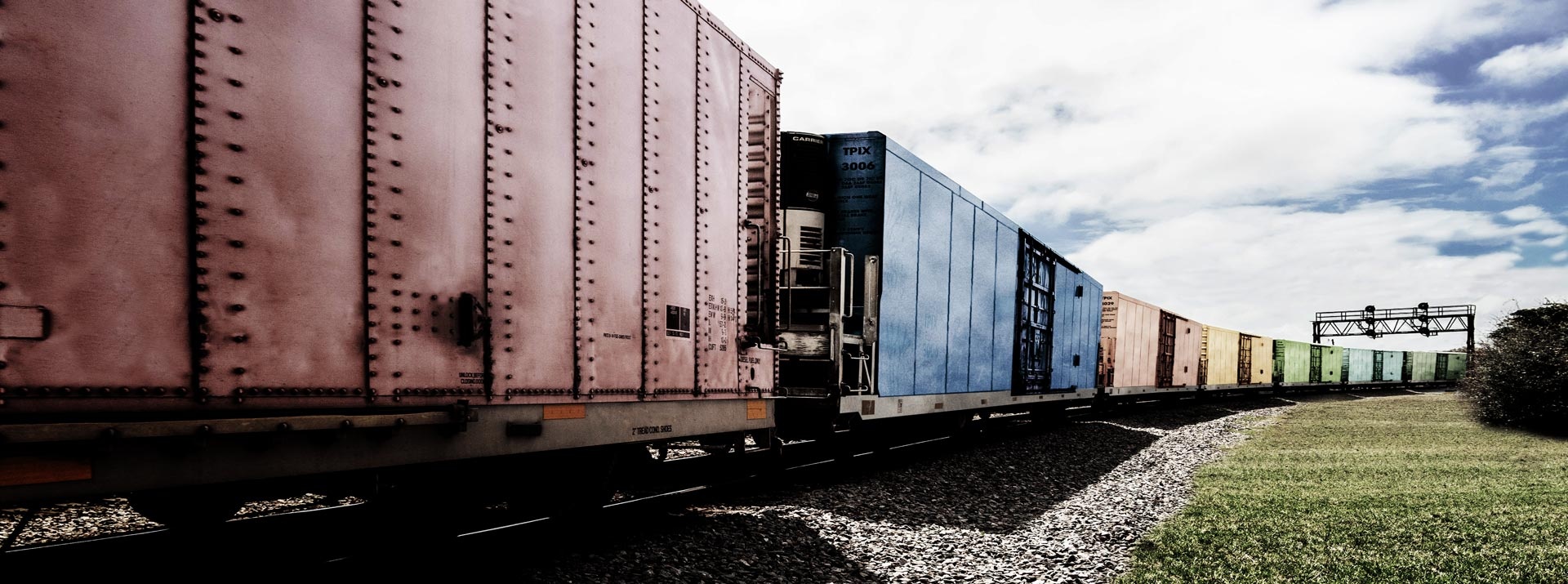 Freight-train-with-containers-on-track
