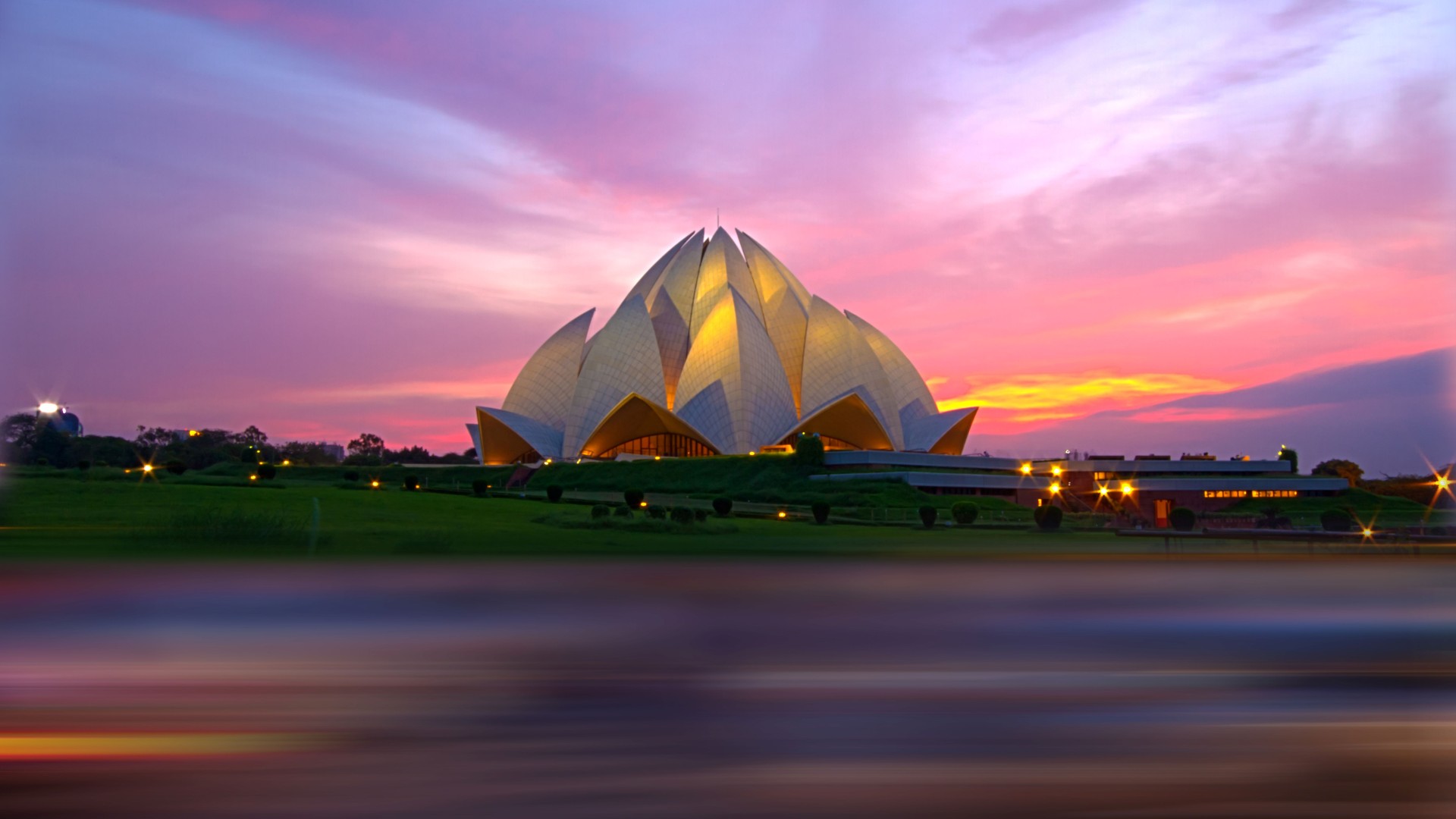 Lotus Temple in New Delhi at sunset – symbolic image for India’s rail and infrastructure expansion