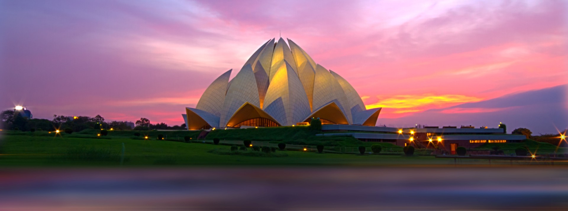 Lotus Temple in New Delhi at sunset – symbolic image for India’s rail and infrastructure expansion